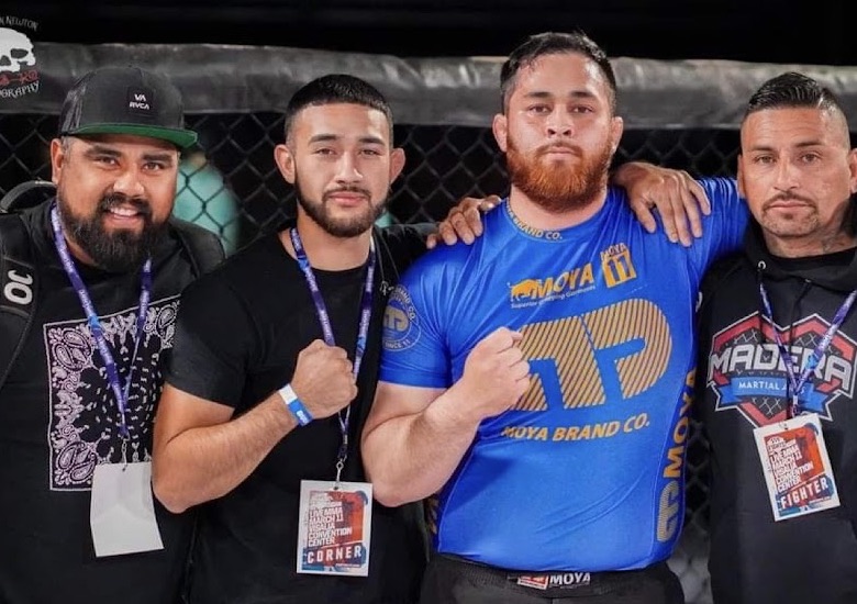 Coach Chris with the Madera Martial Arts fight team at a local event