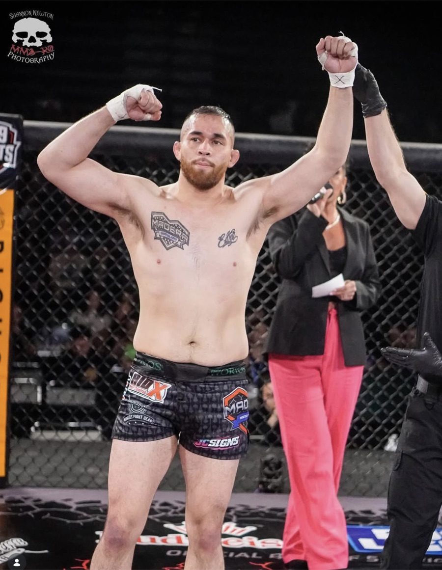 Madera Martial Arts fighter having his hand raised after a win